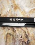 Nůž Sujihiki drážkovaný 27 cm Tamahagane San Black VG-5