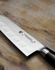 Nůž Santoku drážkovaný 17,5 cm Tamahagane San Black VG-5